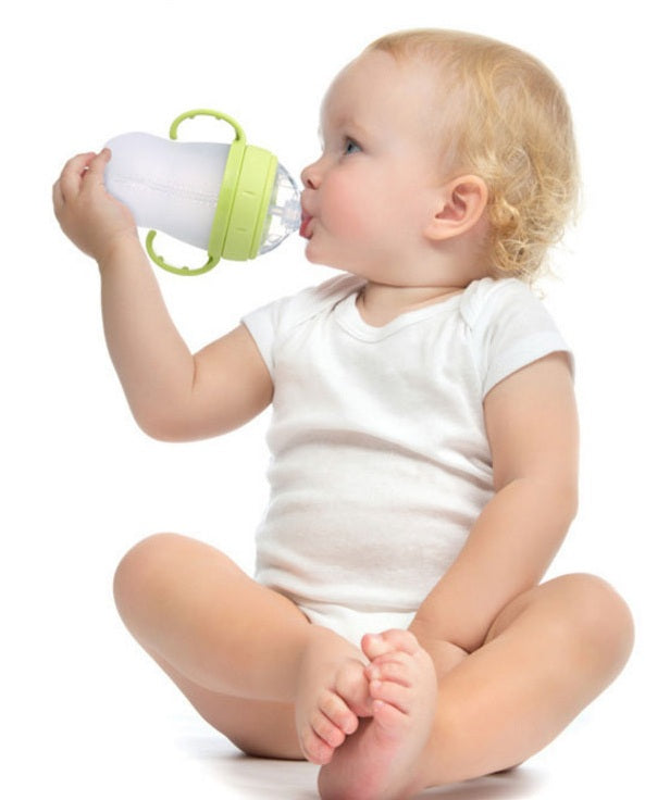 Baby's bottle with spoon